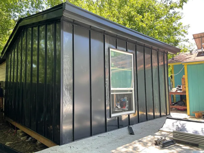 Black standing seam metal wall panels for Metal Roof Installation in Monument